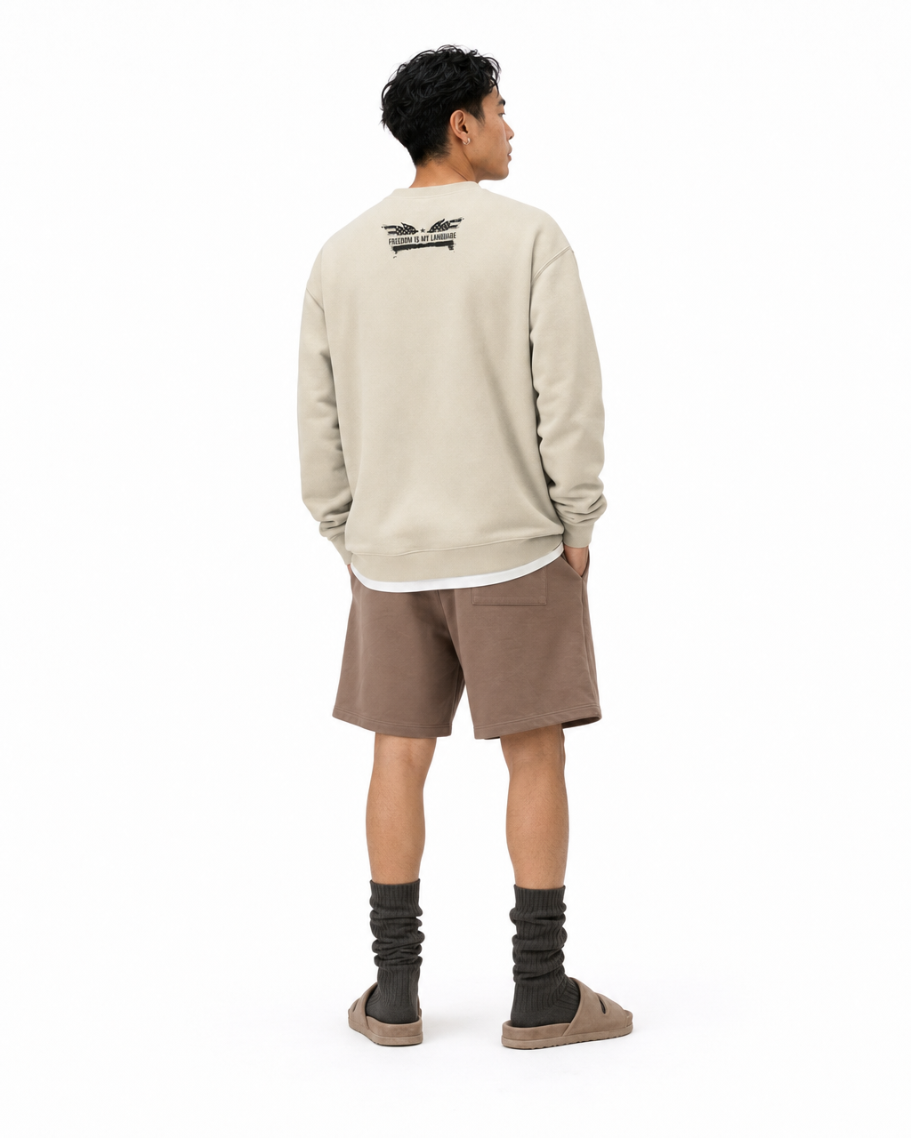 The Sovereign Crewneck Vanguard in Vintage Cream, worn, back
